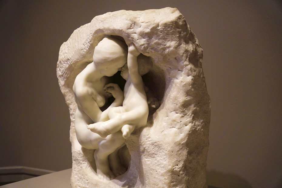 Installed marble sculpture at the Portland Museum of Art in Maine. Final review must consider the complete object, its base and how viewers encounter it in the finished space.